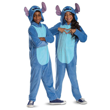 Two children wearing blue onesies with animal ears on a white background