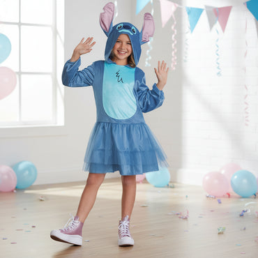 Child wearing a blue costume with animal ears on a white background