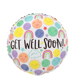 A round foil balloon with a colorful pattern including smiley faces, rainbows, and the text 'GET WELL SOON!' displayed.