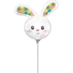 A spotted bunny head mini shape balloon with multicolored ears and a white face.