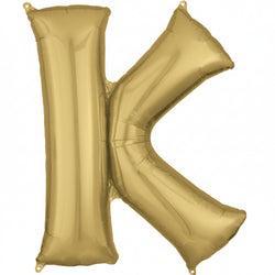 A white gold letter K supershape foil balloon.