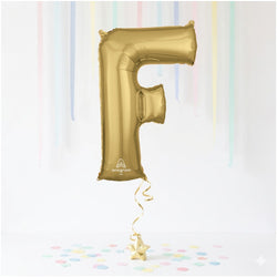 Gold letter 'F' balloon against a white background with colorful confetti