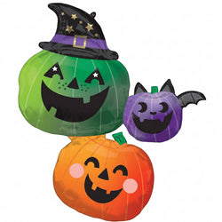 A stack of round foil balloons with cartoonish pumpkin and bat designs, in green, orange, and purple colors.