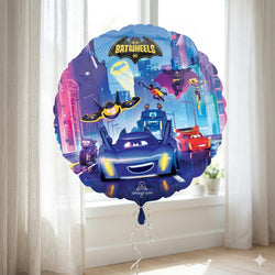 Balloon with Batwheels design featuring cars and a bat symbol, against a light curtain background.