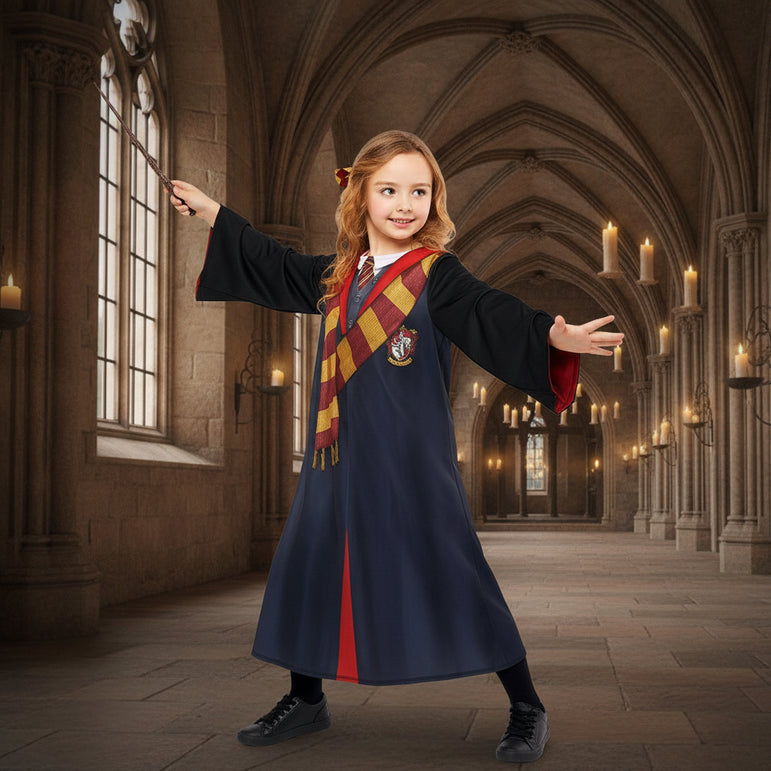 Child wearing a Harry Potter-themed costume with a robe and scarf on a white background