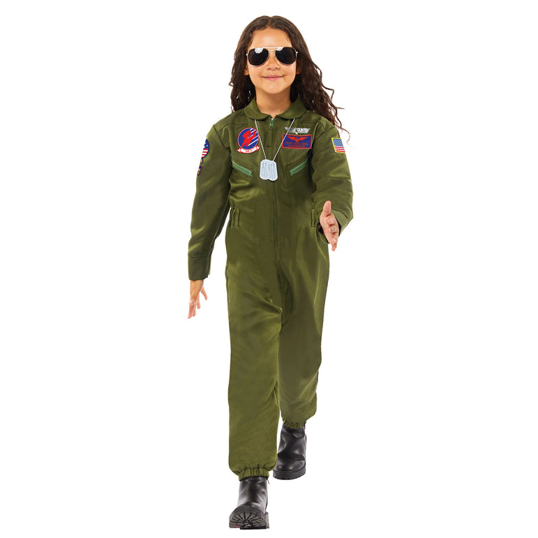 Child wearing green Top Gun flight suit costume walking forward with sunglasses.